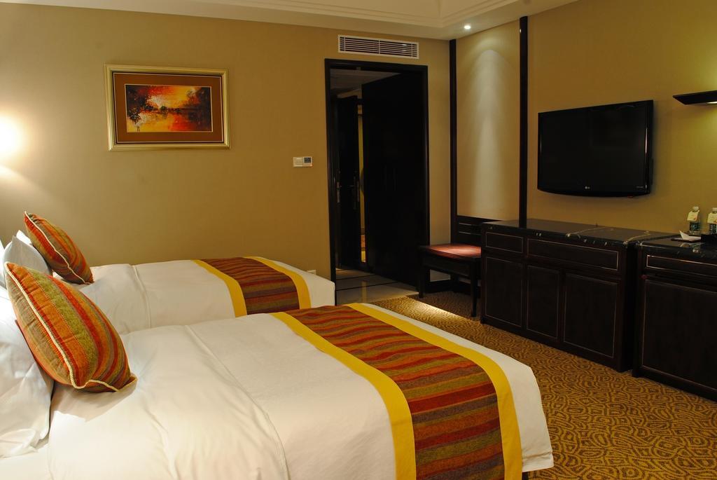 Qingyuan International Hotel Kamer foto
